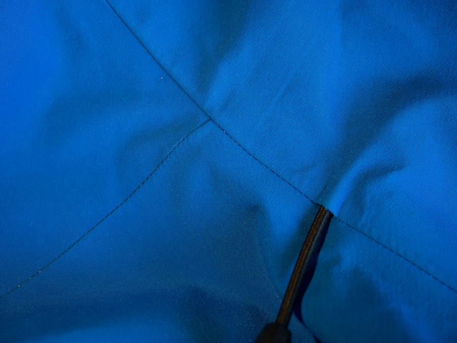 Text image which expands the N80p-X Gore-Tex Pro 3L' into english. N = Nylon. 80 = Yarn Weight. p = Plain Weave. X = High Durability to Weight Ratio. Gore-Tex Pro = Gore ePTFE Membrane. 3L = Three Layer Construction.