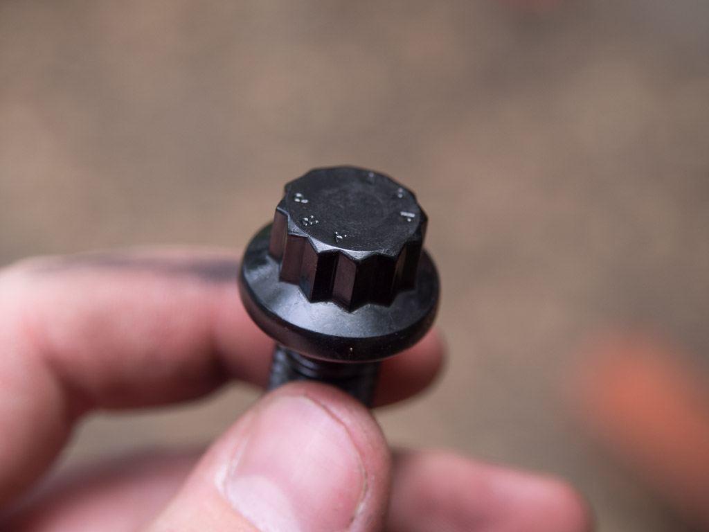 Close up of an ARP 12-point bolt.